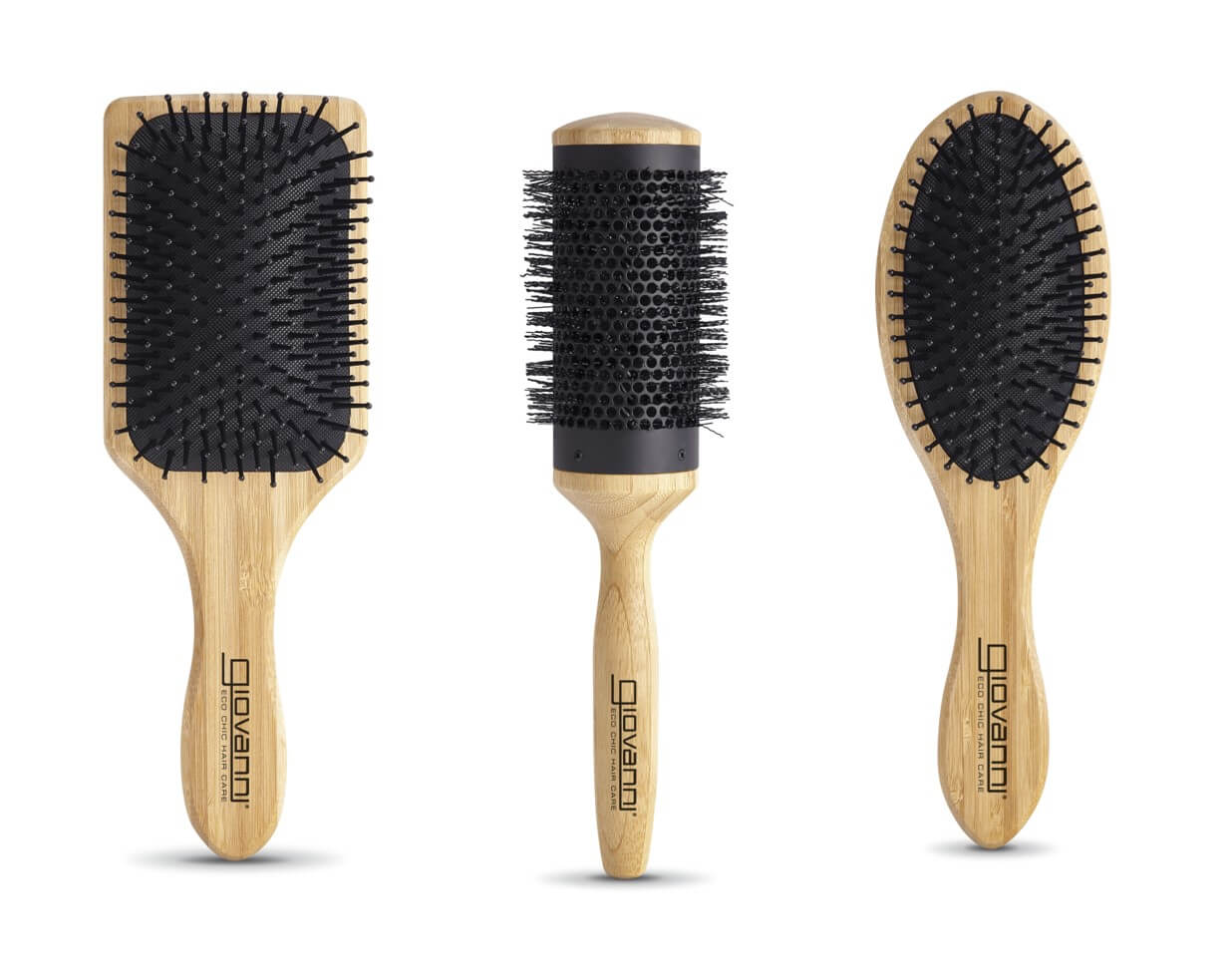 Three wooden-handle hairbrushes are shown upright: a rectangular paddle brush, a round barrel brush with vents, and an oval brush. All have black bristles and the brand name Giovanni on the handles.