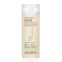 A clear bottle of Giovanni Cosmetics GOLDEN WHEAT™ DEEP CLEANSE SHAMPOO for normal to oily hair, with a white cap and front label, highlights its color-safe formula for oily hair. Available in 2 sizes.