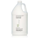 A gallon-sized bottle of Giovanni TEA TREE TRIPLE TREAT INVIGORATING CONDITIONER