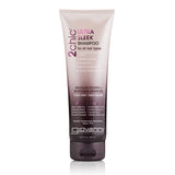 A tube of Giovanni Cosmetics 2chic® ULTRA-SLEEK SHAMPOO for all hair types, with Brazilian Keratin and Moroccan Argan Oil. Gradient pink and white packaging displays product info on the front.