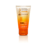 A travel-size tube of Giovanni Cosmetics 2chic® ULTRA-VOLUME CONDITIONER for fine hair, with tangerine and papaya butter. The color-safe orange and white tube stands upright and reflects on a white surface.