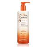 A bottle of 2chic Ultra-Volume Shampoo by Giovanni, with a creamy beige body and orange tint at the base, against a white background.