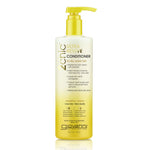 A bottle of 2chic® Ultra-Revive Conditioner by Giovanni, designed for dry or damaged hair.