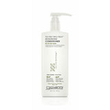A bottle of Giovanni TEA TREE TRIPLE TREAT INVIGORATING CONDITIONER for hair care.