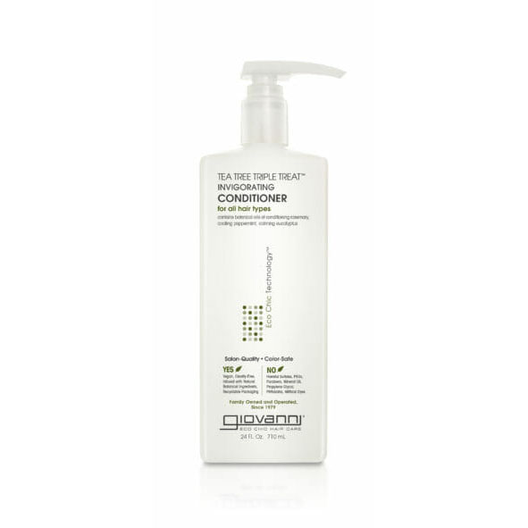 A bottle of Giovanni TEA TREE TRIPLE TREAT INVIGORATING CONDITIONER for hair care.