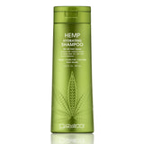 A green bottle of Giovanni Cosmetics HEMP HYDRATING SHAMPOO for all hair types features a large hemp leaf design and white text. This vegan shampoo, infused with Hemp Seed Oil, is available in 3 sizes (including 13.5 fl oz/399 mL).