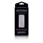 A black box labeled Giovanni Cosmetics ELEGANT SILVER SATIN PILLOWCASE features a window showing the light silver satin pillowcase inside. Text highlights benefits for hair and skin—designed to prevent frizz and reduce breakage.