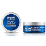 Two containers of Giovanni Cosmetics MEN Styling Hair Clay, one top view and one front view, both in blue and silver packaging. This hair clay provides a strong hold with a natural matte finish.