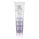 A tube of Giovanni Cosmetics 2chic® ULTRA-SHINE SHAMPOO, suitable for all hair types, features Tsubaki and white tea to tame frizz. Its white and lavender packaging emphasizes its ultra-shine benefits for natural hair care. Available in 2 sizes.