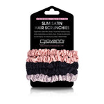 A 5-pack of SLIM SATIN HAIR SCRUNCHIES in blush, black, and gray by Giovanni Cosmetics is shown on branded packaging, featuring anti-tangle satin bands and product details.