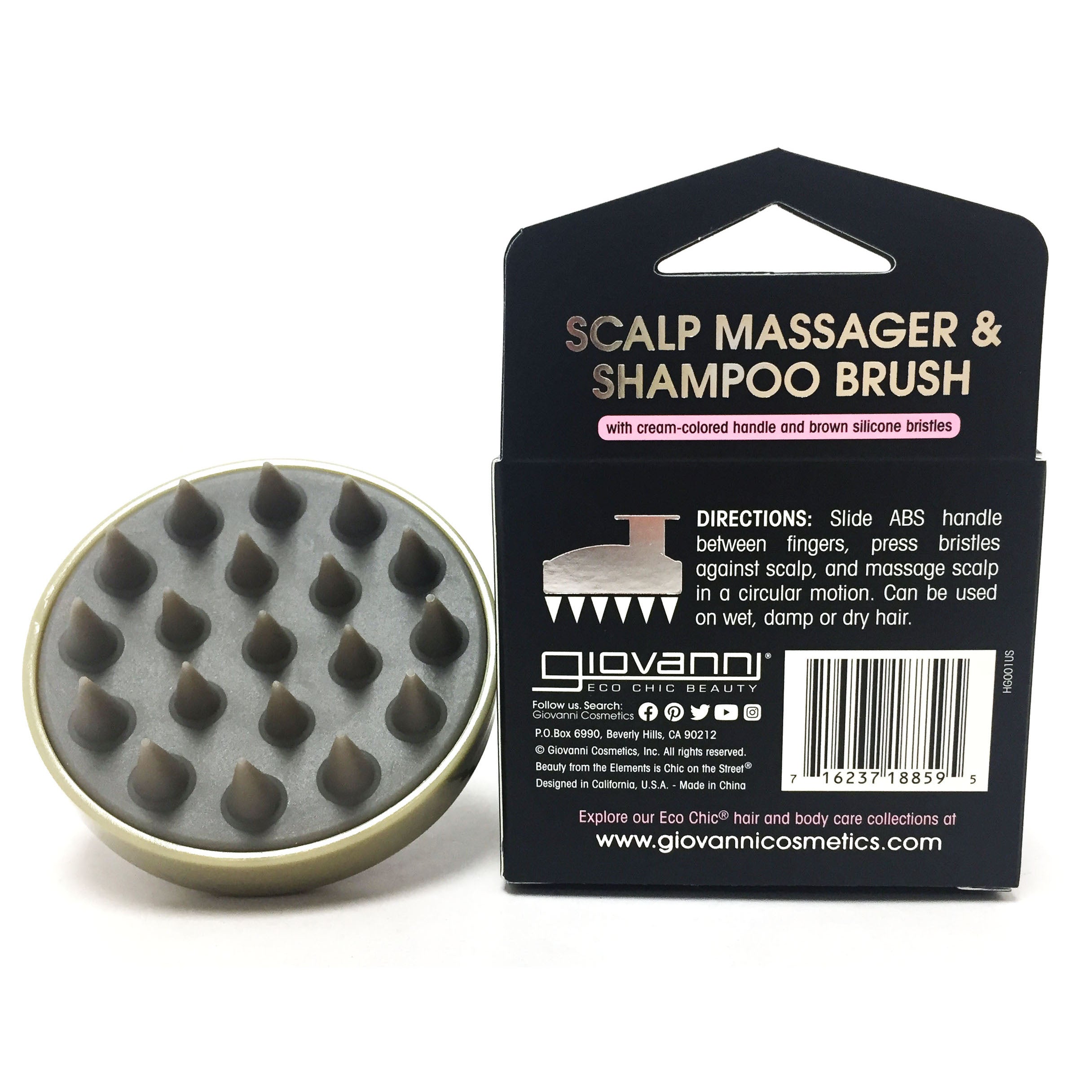The Giovanni Cosmetics SCALP MASSAGER & SHAMPOO BRUSH with a tan handle is shown beside its packaging detailing directions and branding—ideal for stress relief and enhancing your natural hair care routine.