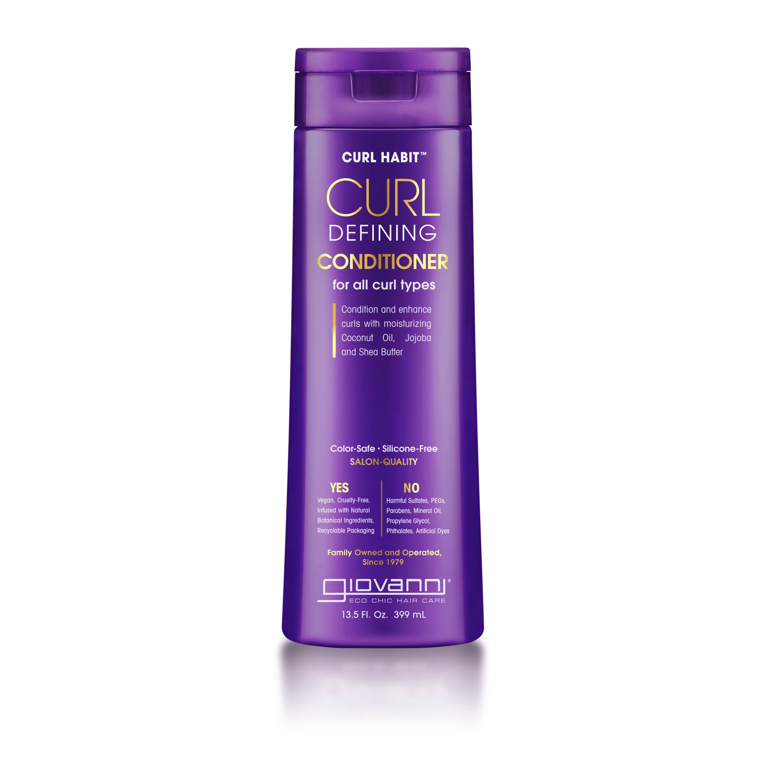 CURL DEFINING CONDITIONER FOR ALL CURL TYPES - A purple bottle of Giovanni Cosmetics' CURL HABIT™ Curl Defining Conditioner for all curl types, infused with coconut oil, jojoba, and shea butter. It's color-safe, silicone-free, salon-quality, and available in 2 sizes.