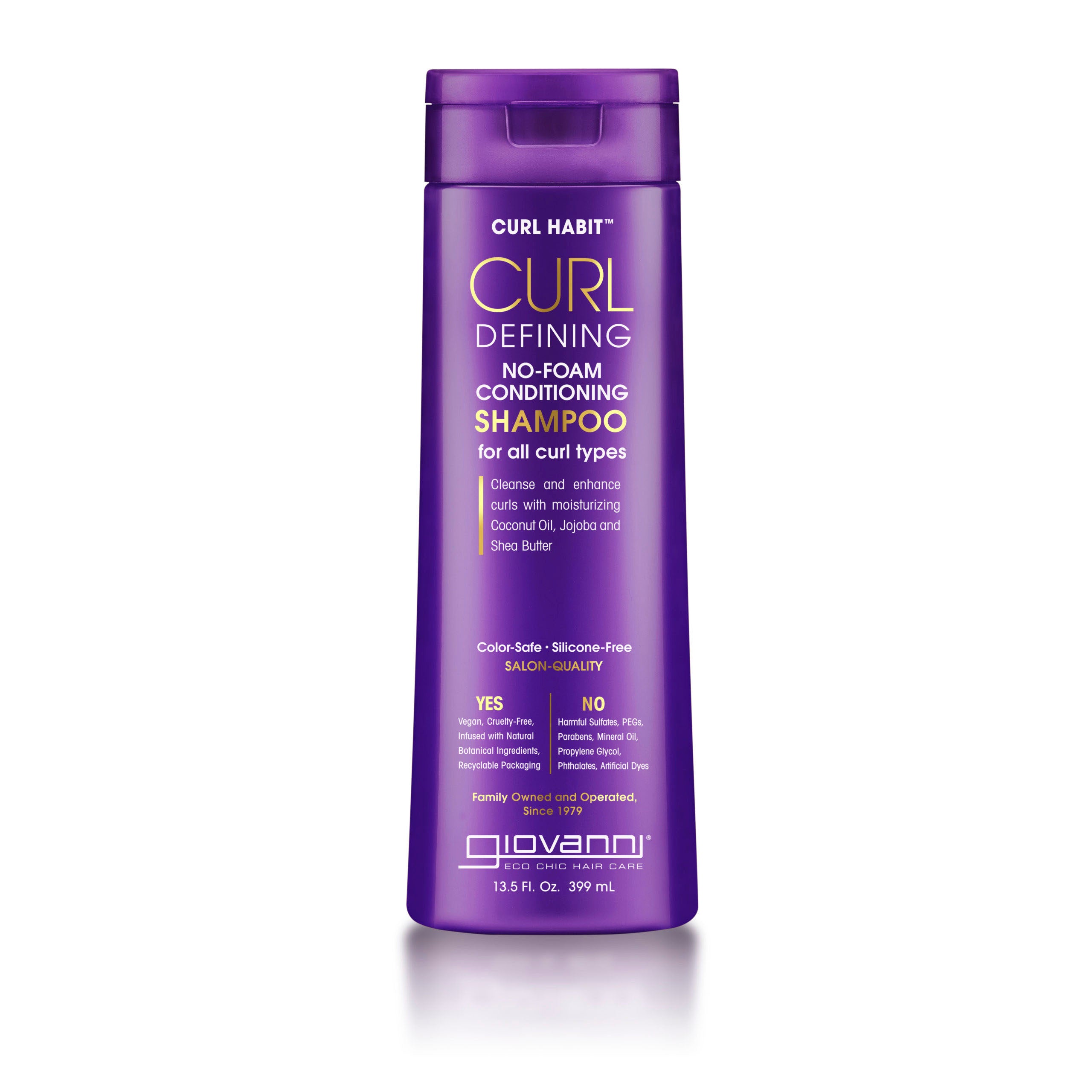 A purple bottle of Giovanni Cosmetics CURL HABIT™ Curl Defining No-Foam Conditioning Shampoo, made for curly hair with moisturizing coconut oil, jojoba, and shea butter to define and hydrate all curl types.