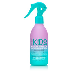 A purple and turquoise spray bottle labeled ECO CHIC® KIDS HAIR SMOOTHING & DETANGLING SPRAY by Giovanni Cosmetics, with a trigger nozzle, offers a gentle, cruelty-free detangling solution that's safe for kids.
