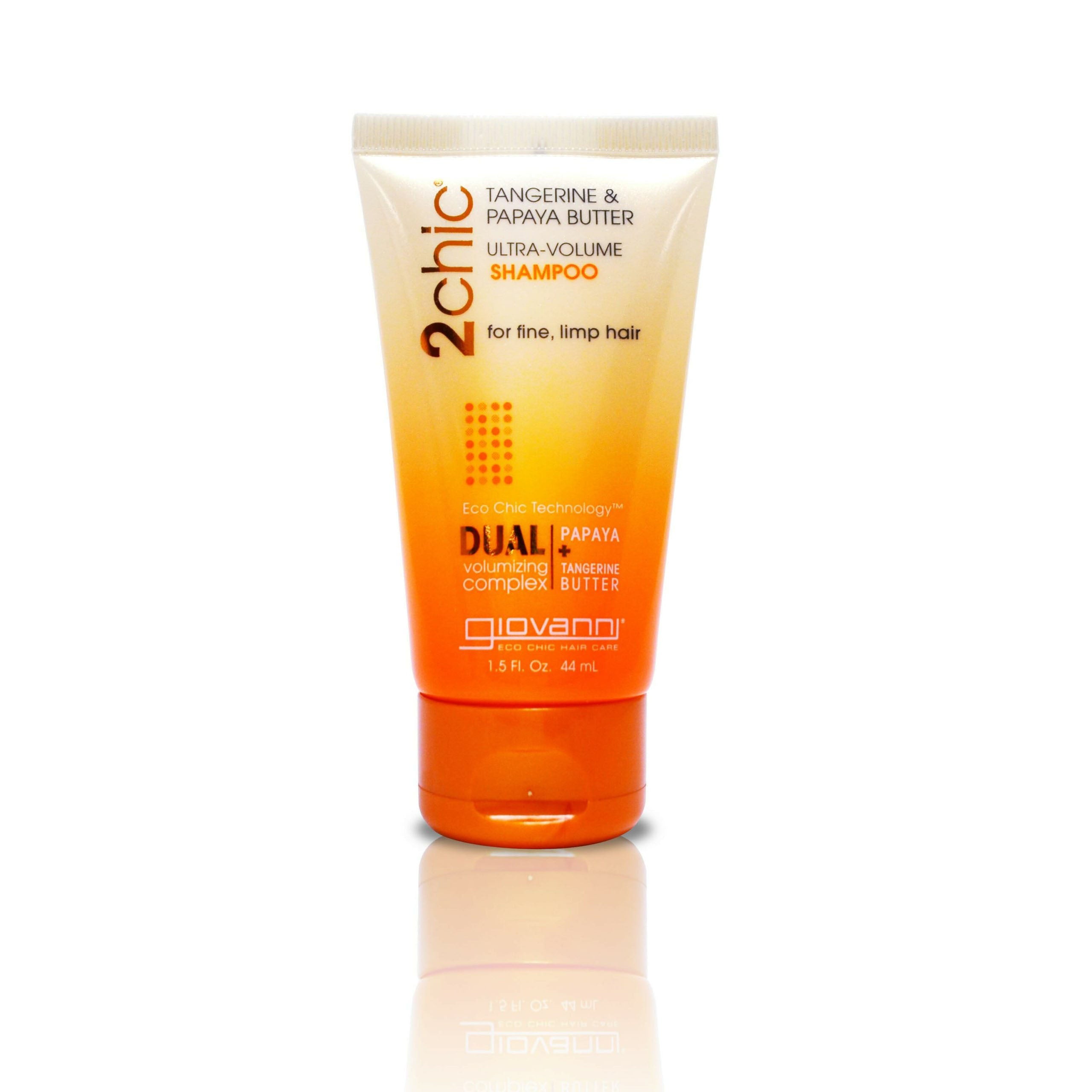 Recommended for Limp, Lifeless Hair - A travel-size tube of Giovanni Cosmetics 2chic® ULTRA-VOLUME SHAMPOO for fine hair, with tangerine and papaya butter. The orange-yellow tube is color-safe, featuring product details on the front.