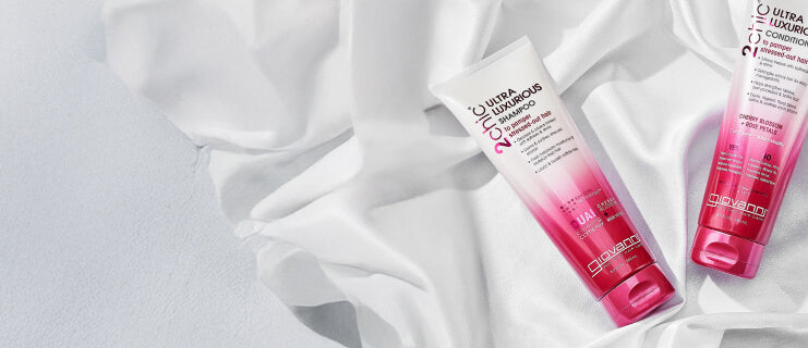 Bottles of 2chic Ultra-Luxurious Shampoo and Conditioner
