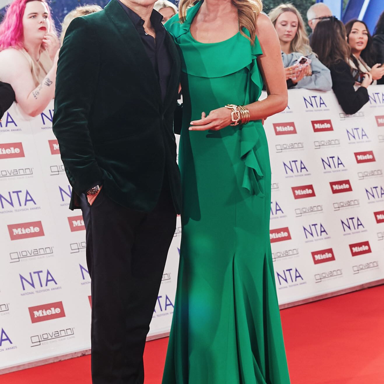Man and woman on the red carpet at the National Television Awards