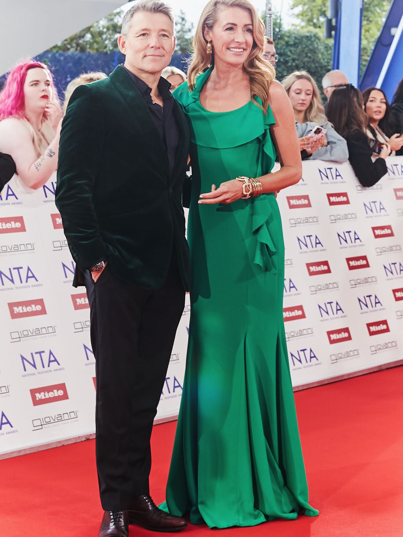Man and woman on the red carpet at the National Television Awards