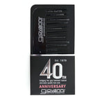 The black and silver GIOVANNI® 40th ANNIVERSARY WIDE TOOTH HAIR COMB by Giovanni Cosmetics features bold “40th” text, “Est. 1979,” and inner flap product facts on detangling and reducing hair breakage.