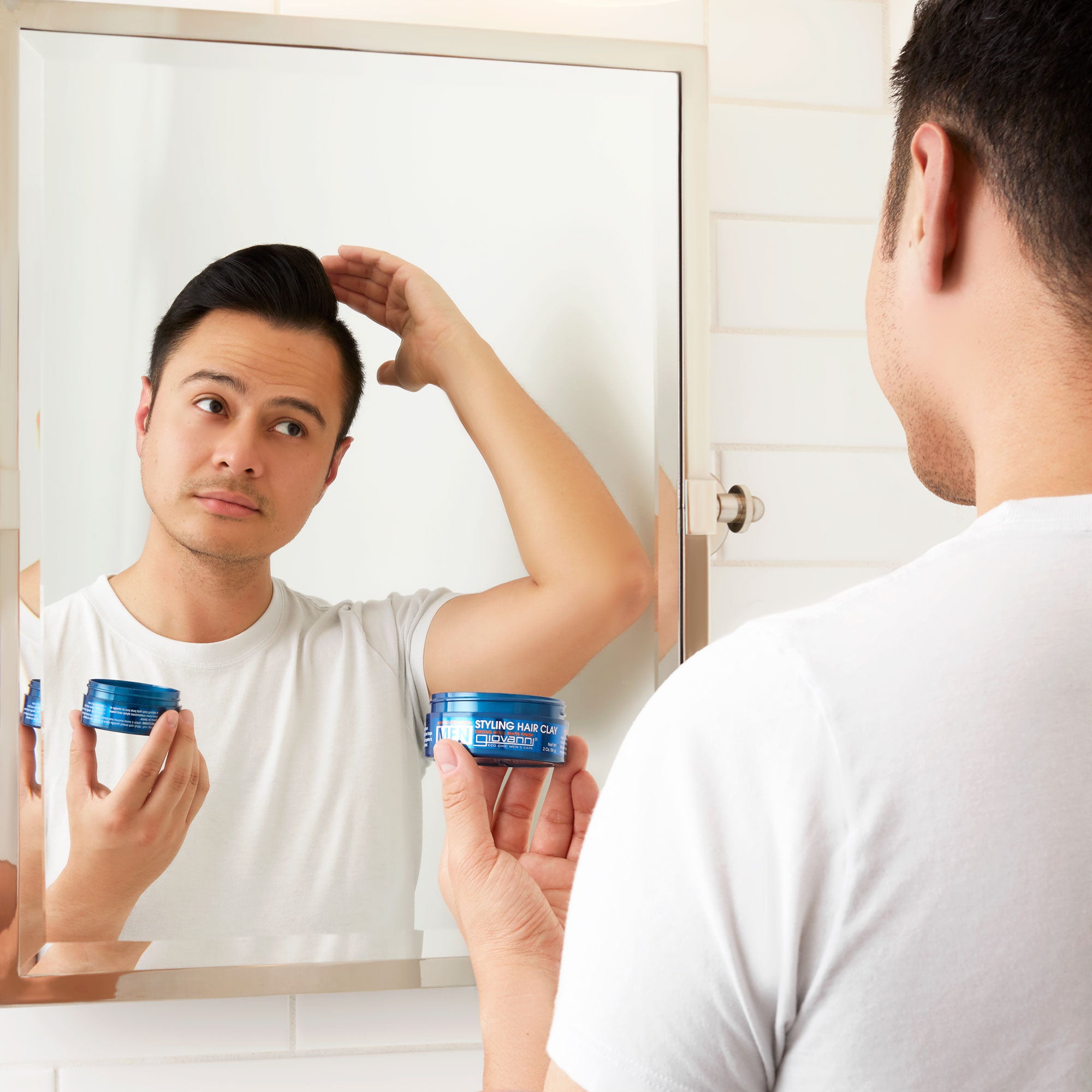 Man using Giovanni Men Styling Hair Clay