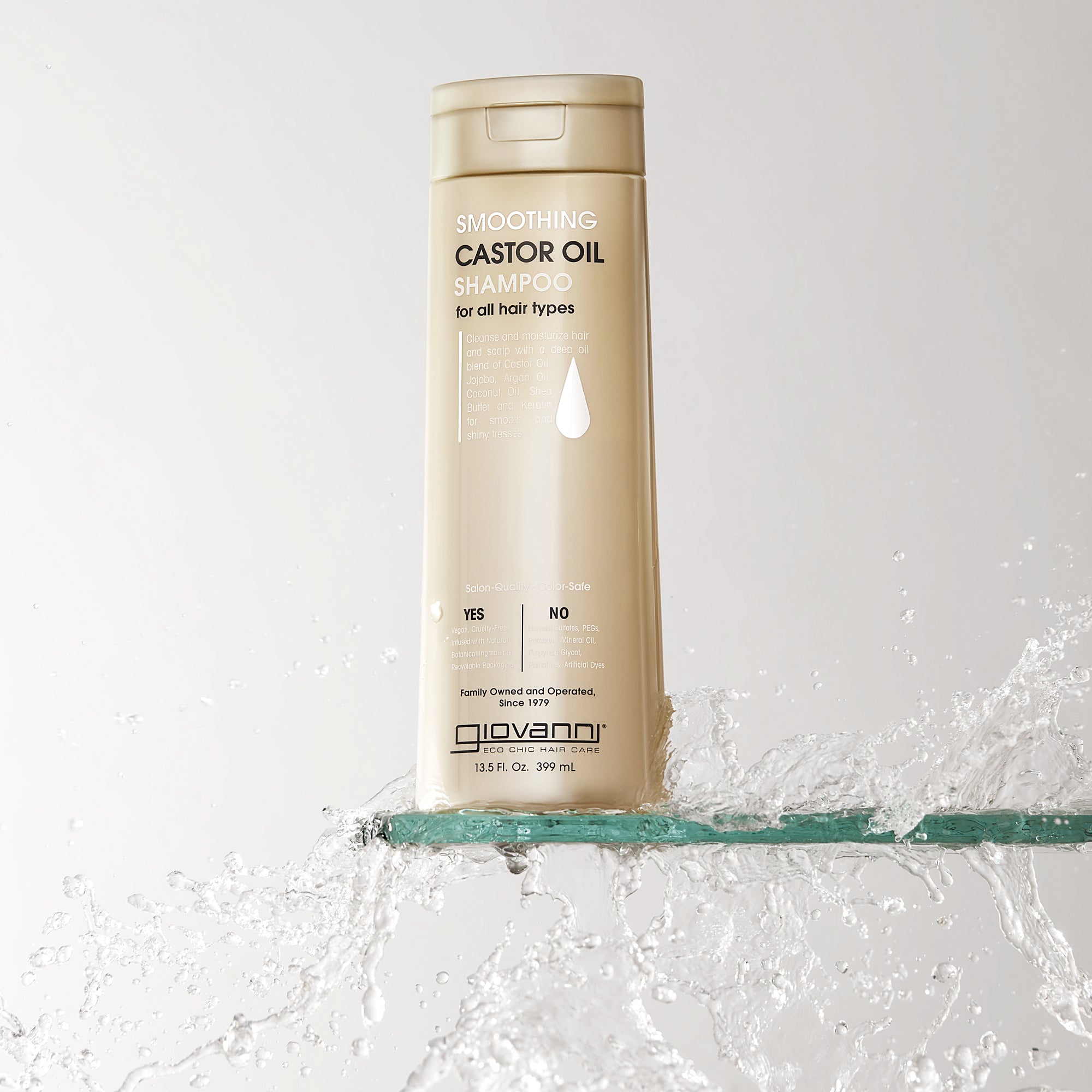 Bottle of Giovanni Smoothing Castor Oil Shampoo