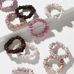 The Giovanni Cosmetics SLIM SATIN HAIR SCRUNCHIES (5 pack) are anti-tangle hair accessories in Pink, Beige, Mauve, Copper, and Dark Brown shades, displayed on a white surface with soft shadows.