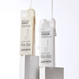 Bottles of Smooth as Silk Shampoo and Conditioner