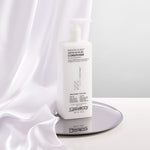 Bottle of Smooth as Silk Deeper Moisture Conditioner