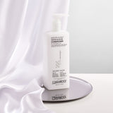 Bottle of Smooth as Silk Deeper Moisture Conditioner