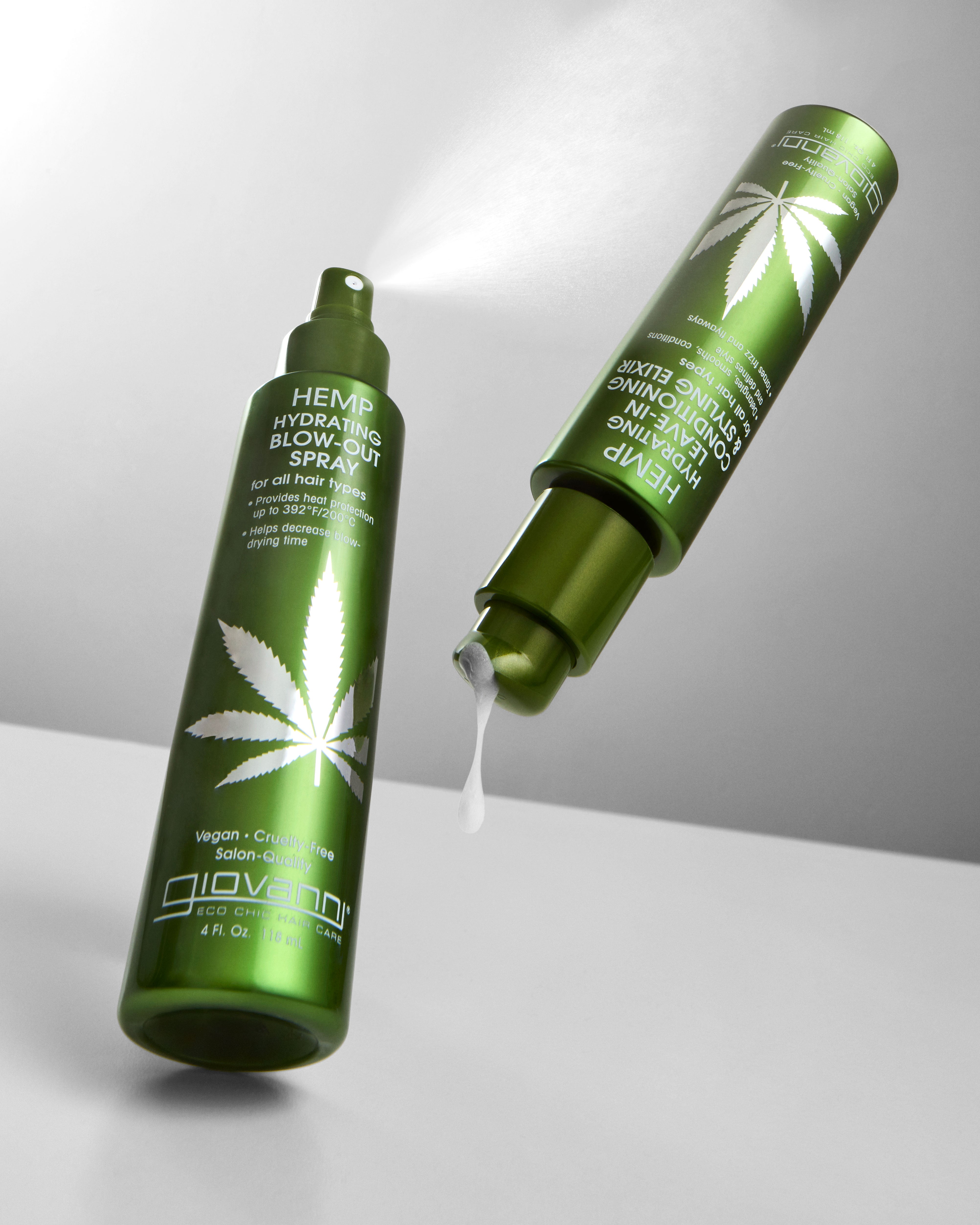 Green bottle of blow-dry spray to provide heat protectant.