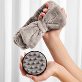Hands holding Giovanni Scalp Massager and Headband