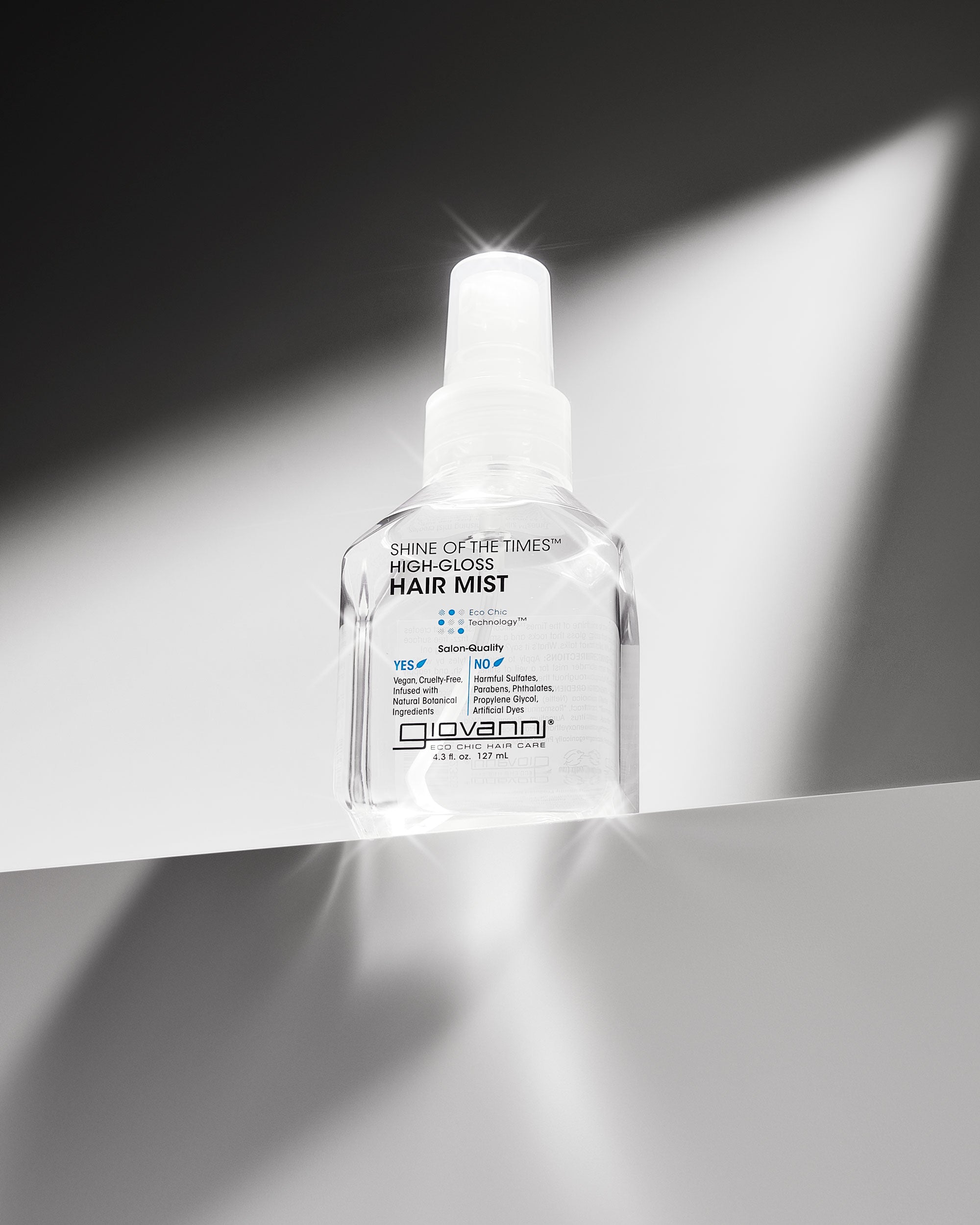 Bottle of Giovanni Shine of the Times High-Gloss Hair Mist