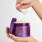 Jar of CURL Defining Deep Conditioning Hair Mask with a hand scooping out some of the product.