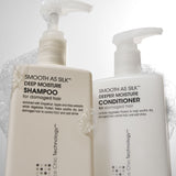 Two white pump bottles of Giovanni Cosmetics SMOOTH AS SILK™ DEEPER MOISTURE CONDITIONER, labeled for damaged hair, offer color-safe, silky hydration and appear with bubbles on top against a light background.