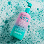 Giovanni Kids body wash bottle on a background with bubbles