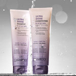 Two bottles of Giovanni Ultra Shine Shampoo and Conditioner on a gray background with water droplets.