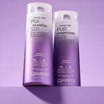 Two bottles of Giovanni Cosmetics COLOR CHIC™ PURPLE CONDITIONER for blonde, silver, gray, white, and lilac-toned hair stand side by side against a light purple background.