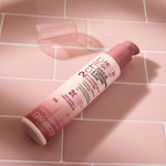 Bottle on 2Chic Frizz be Gone Leave in Conditioner & Styling Elixir