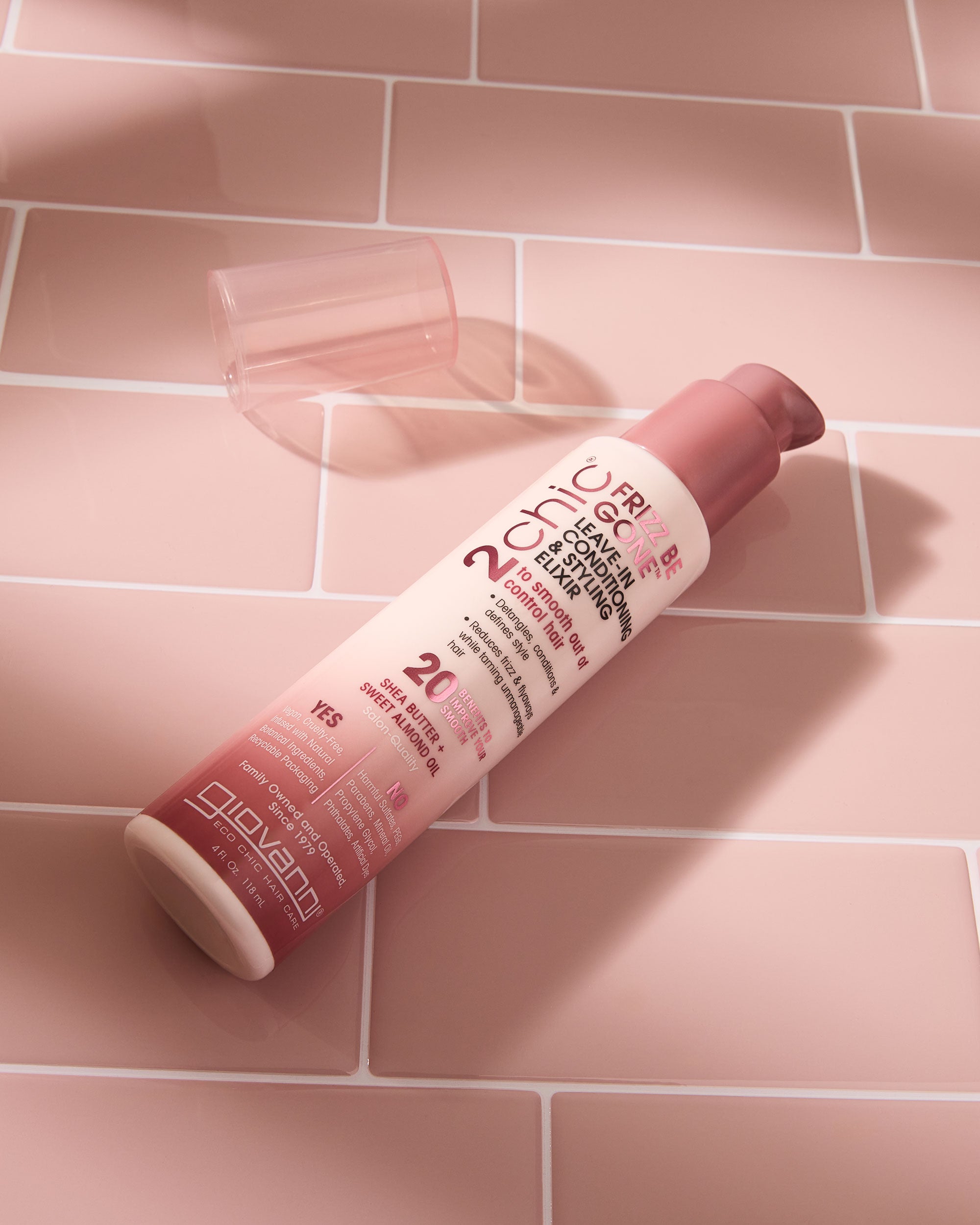 Bottle on 2Chic Frizz be Gone Leave in Conditioner & Styling Elixir