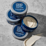 Jars of Giovanni Men Styling Hair Clay on a gray surface