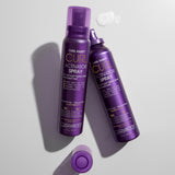 Two bottles of Giovanni Curl Activator Spray on a light gray background