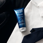 Giovanni Men's hair styling gel tube on a white shirt with a black tie