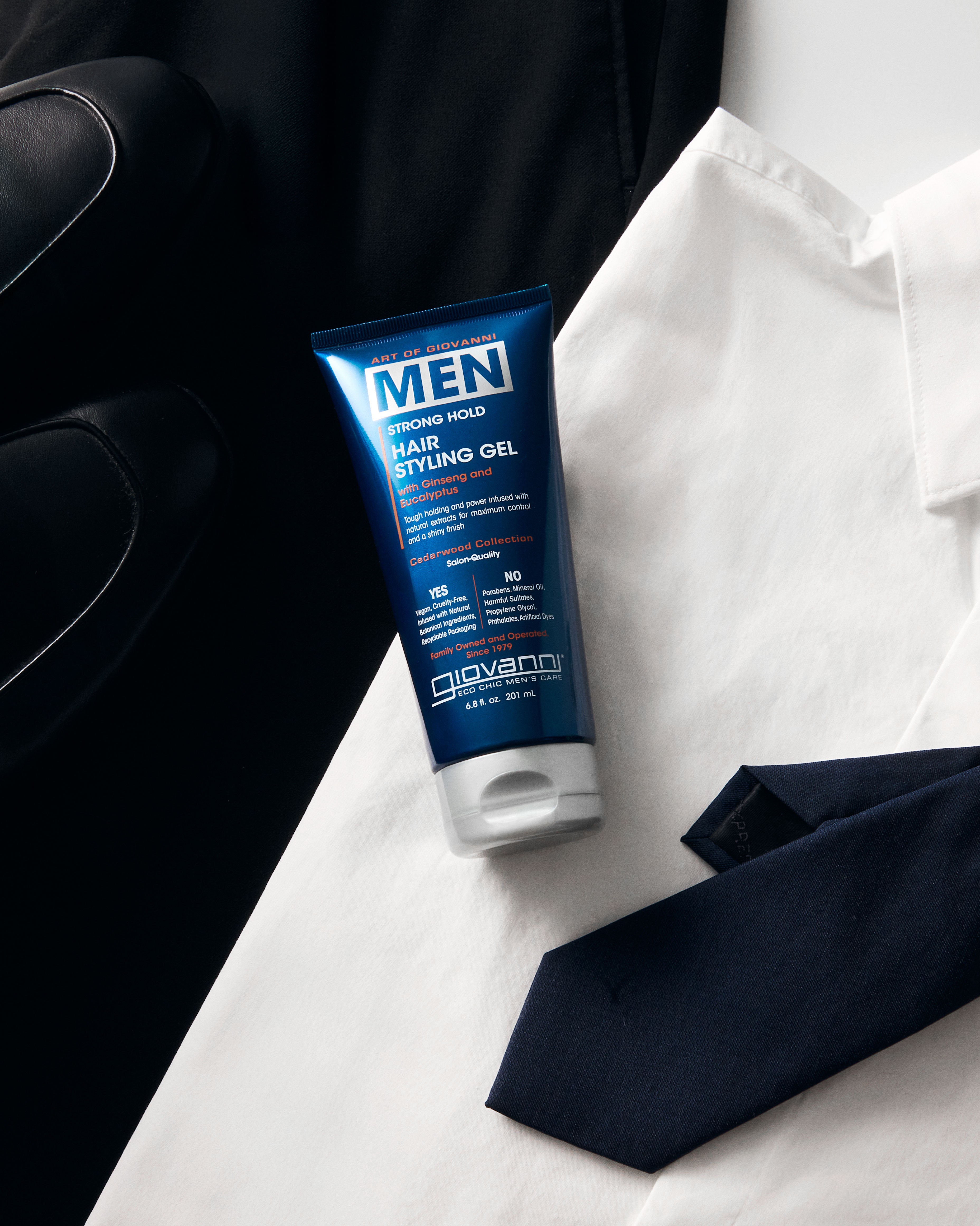 Giovanni Men's hair styling gel tube on a white shirt with a black tie