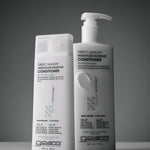 Two bottles of Giovanni Direct Leave-In Weightless Moisture Conditioner on a gray background