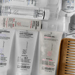 Giovanni hair care products including styling gel and hair thickener on a white background.