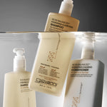 Giovanni 50:50 Balanced Hydrating-Clarifying shampoo and conditioner bottles in water