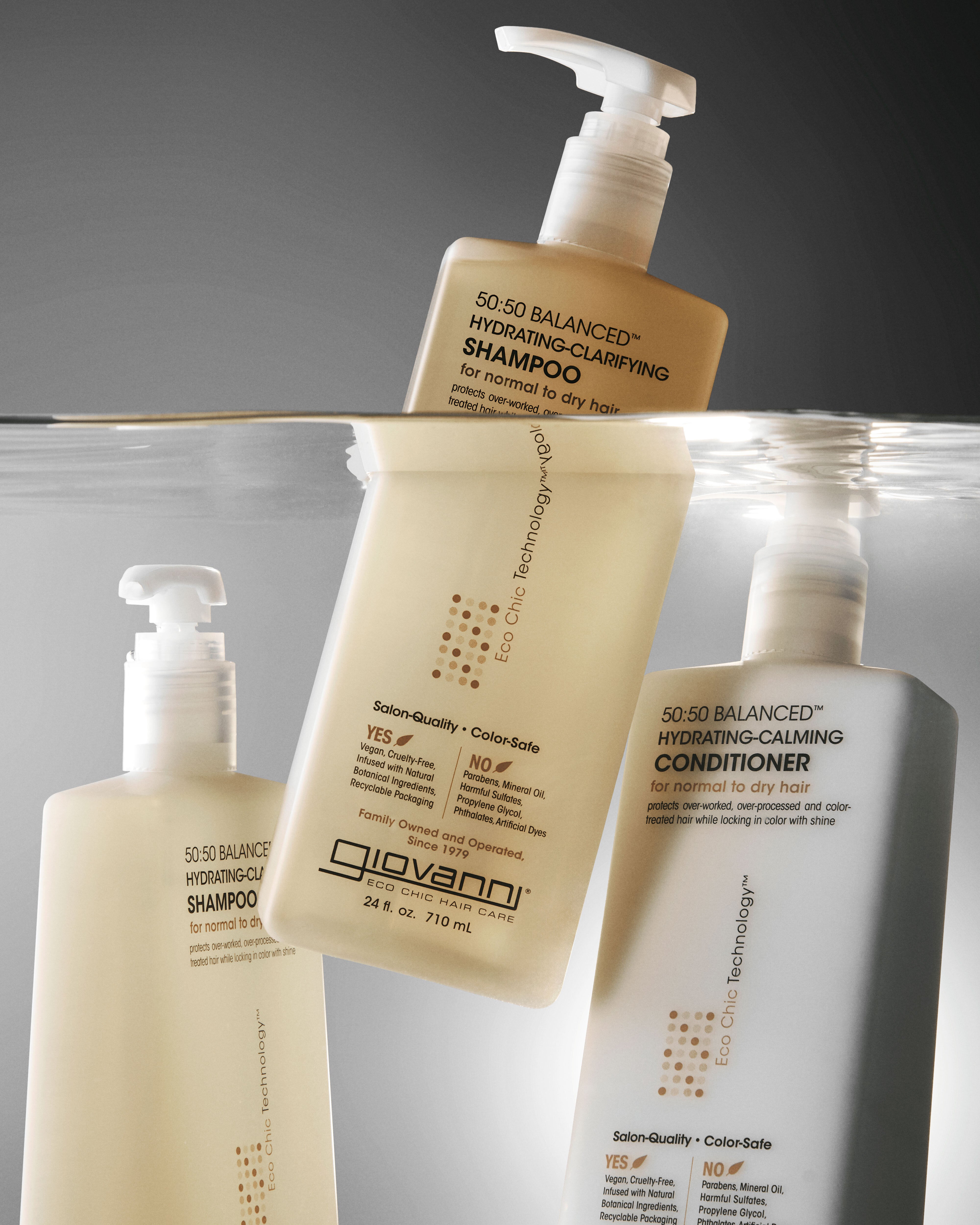 Giovanni 50:50 Balanced Hydrating-Clarifying shampoo and conditioner bottles in water