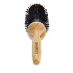 The 3" BAMBOO THERMAL HAIRBRUSH by Giovanni Cosmetics is a salon-quality round brush with black bristles and a light bamboo handle, featuring the Giovanni Cosmetics brand name printed in black on the handle.