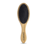 The BAMBOO OVAL HAIRBRUSH by Giovanni Cosmetics features a black cushioned base and widely spaced bristles, shown on a white background—a sustainable styling tool designed for effortless grooming.