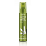 A green spray bottle of Giovanni Cosmetics HEMP HYDRATING BLOW-OUT SPRAY for all hair types, with a cannabis leaf graphic, is vegan, cruelty-free, and uses Hemp Seed Oil for heat protection and frizz control.